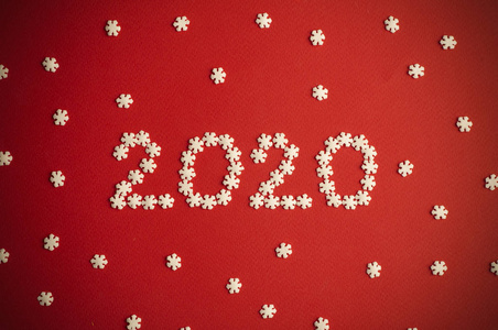 New Year 2020. Creative number 2020 written in white snowflakes 