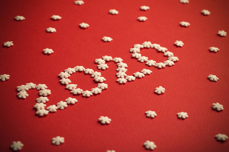 New Year 2020. Creative number 2020 written in white snowflakes 