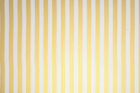 黄白相间的台布织物(灯泡退化).家纺面料.照片