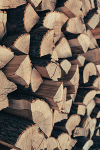 Preparation of firewood for the winter. Firewood background.  