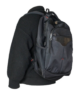  black backpack dressed in a knitted  sweater isolated on a whit