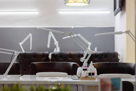 nail workplace area tables lamps in salon manicure studio . serv