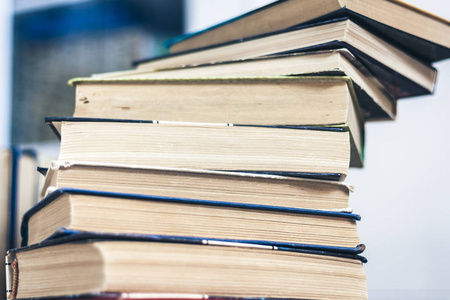 Stack of books education background, many books piles with copy 