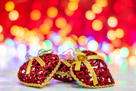 Glittery heart shaped Christmas balls. Christmas decorations on 