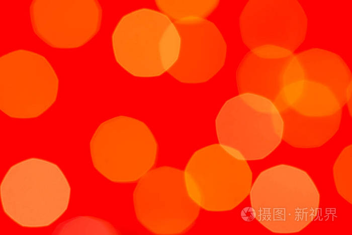 红色上有黄色闪光的背景纹理