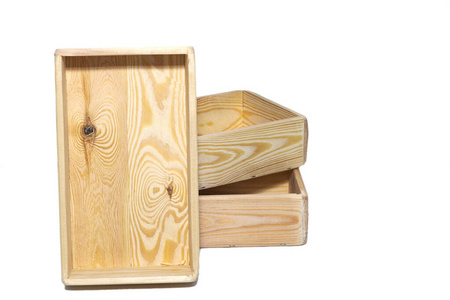 Empty wooden box. Made of pine, on a light white background.