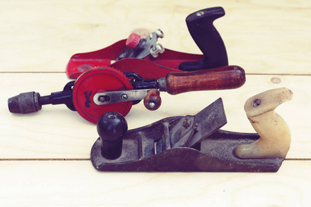 Joinery  old wooden plane, wood polishing tool in a workshop 