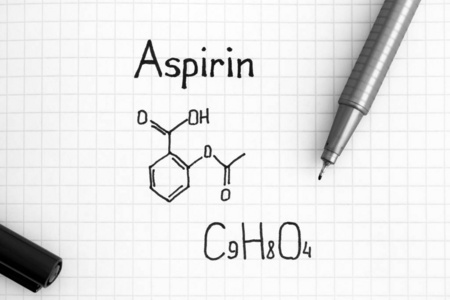 Chemical formula of Aspirin with black pen. 