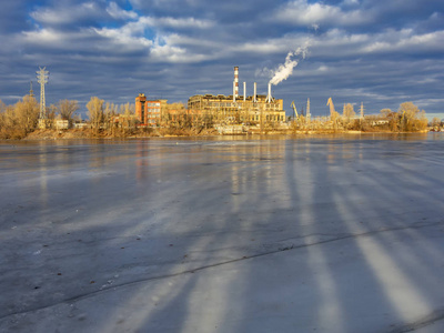 Old power plant in winter time. 