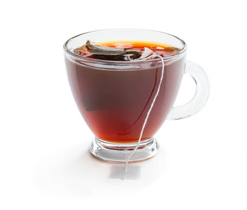 Cup of black tea with tea bag isolated on white 