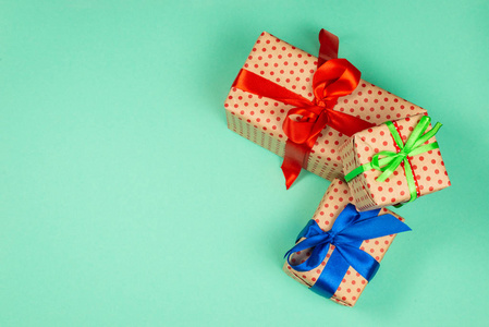 Gift boxes on a green background. 