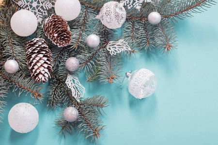 Christmas decorations on blue paper background 