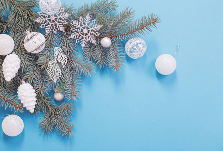 Christmas decorations on blue paper background 