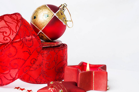 Christmas red decoration with candle around white background 