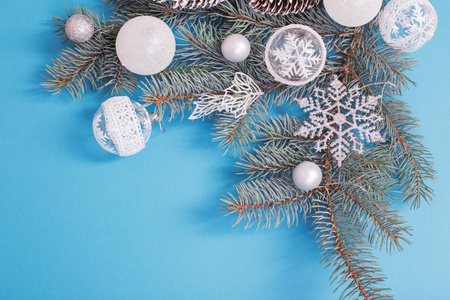 Christmas decorations on blue paper background 