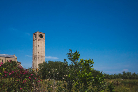 Cathedral of Santa Maria Assuntas bell tower under blue sky on 