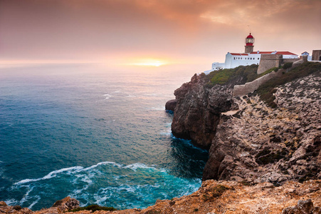 Lighthouse on Cape St. Vincent at sunset, Algarve, Portugal. 