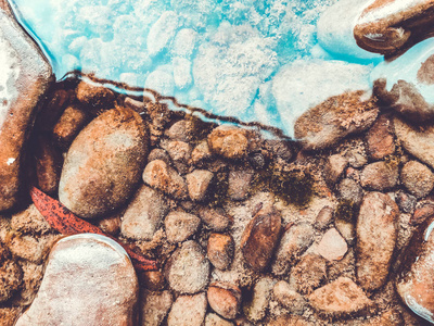 卵石海滩背景，石头地板。抽象自然卵石ba