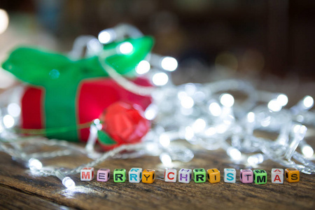 Selective focus of Colorful Alphabet beads Merry Christmas and