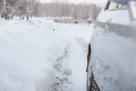 Car on a winter road. Snowy road. 