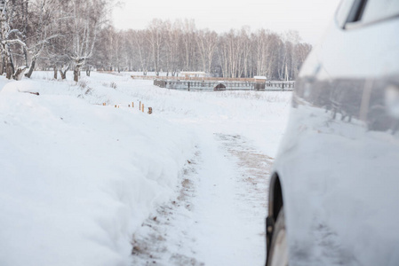 Car on a winter road. Snowy road. 