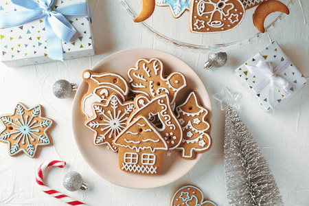 Plate with Christmas cookies, Christmas trees, toys, gift boxes 