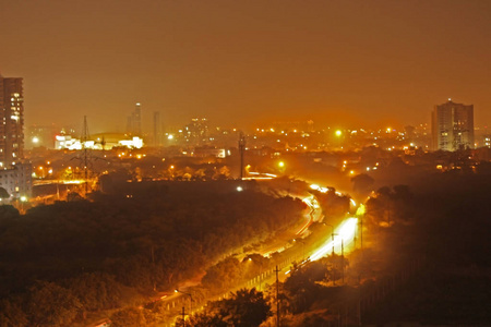 view of the cityscape of Noida at night 