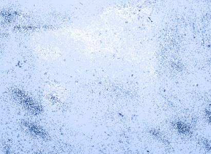 经典的蓝色五彩纸屑和蓝色背景上的星星和闪光.照片