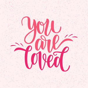 手写你是爱的短语。情人节贺卡，2月14日。粉红色独立插图。毛笔字体设计，可用于圣瓦伦丁节印刷