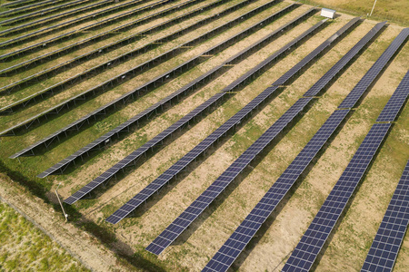 Aerial view of solar power plant. Electric panels for producing 