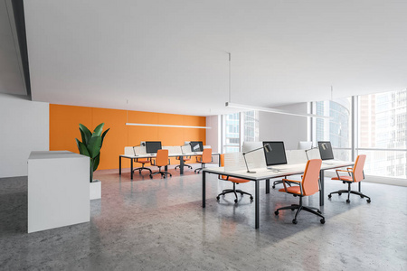白色和橙色开放空间办公室角落