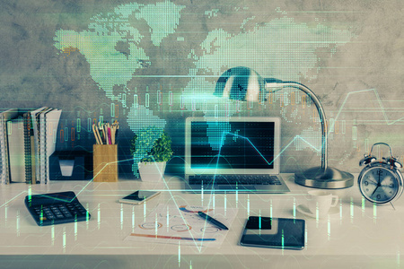 有电脑背景的多功能海图财务信息和工作空间。国际网上交易的概念。