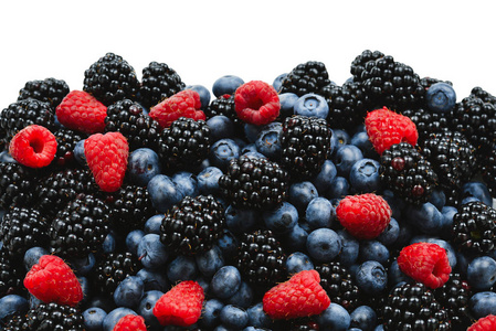 黑莓，覆盆子，蓝莓背景。俯视图。