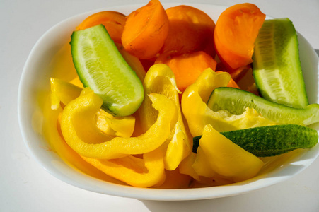 Cucumbers, tomatoes, sweet peppers, cooking salads, a cold dish 