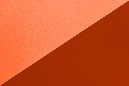 橙红色的纸张背景.对角线方向.2020年流行色.照片