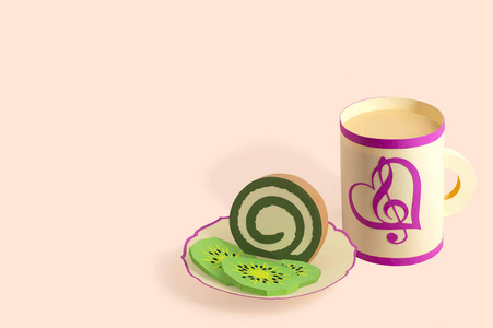 Paper roll cake with kiwi marmalade and paper mug 