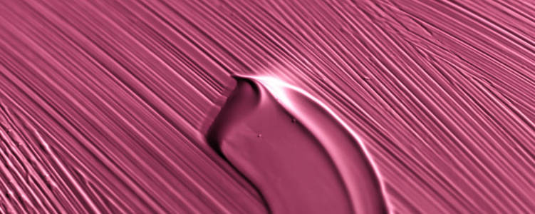 Cosmetics abstract texture background, pink acrylic paint brush 