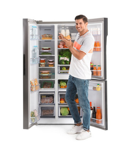 技术 满的 营养 肖像 冰箱 蔬菜 新的 家庭 白种人 厨房