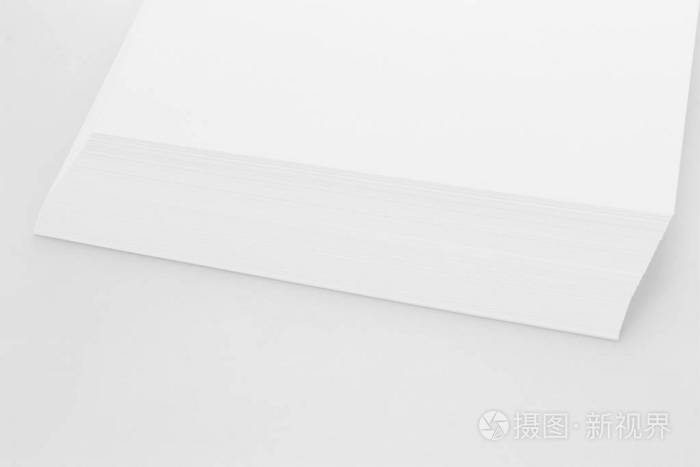 白色背景上有柔和阴影的a4空白纸叠照片 正版商用图片26pzvo 摄图新视界