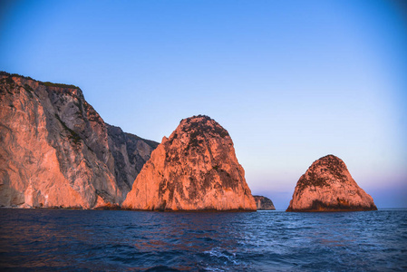 旅行 日落 阳光 海洋 岩石 房子 希腊 美丽的 海景 海岸