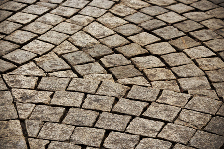 灰色干燥的方形道路瓷砖排列成扇形设计