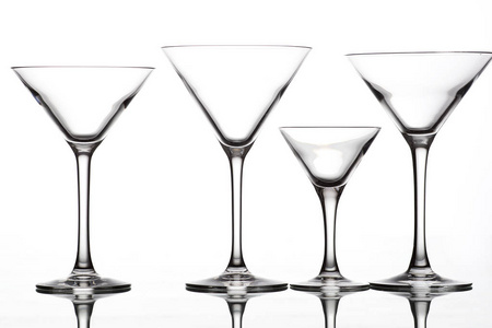  glasses of different shapes on a white background