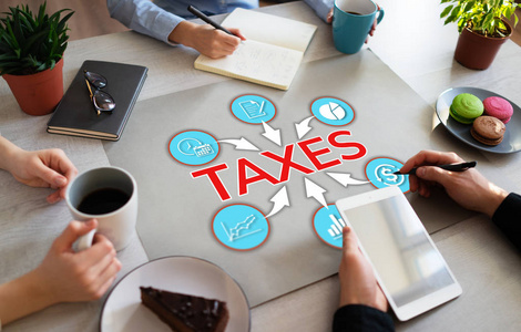 办公桌上的税务图政府定期支付增值税业务概念。