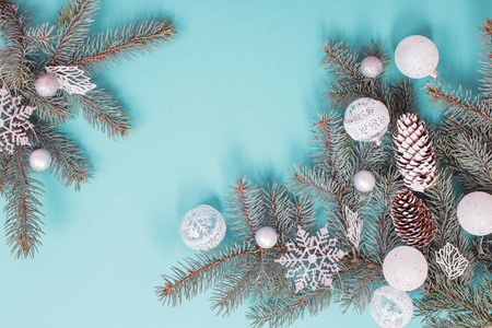 Christmas decorations on blue paper background 