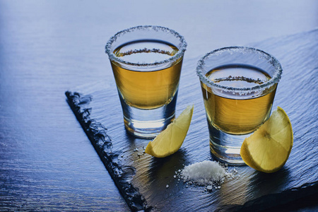 alcoholic drink with lemon and salt 