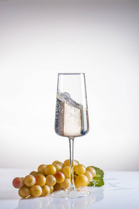 A glass of champagne on a white background. 