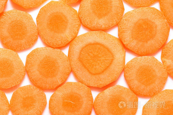 白底鲜切胡萝卜片特写