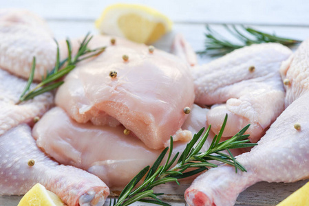 fresh raw chicken with rosemary lemon herbs and spices  Breast 