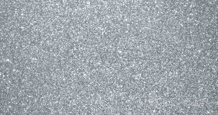 银光闪闪的背景闪闪发光的发光颗粒质感银光火花和闪光箔亮片背景与