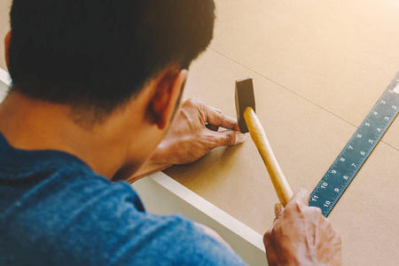 Service man assembling furniture for customer, Delivery service 